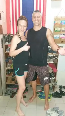a man and a woman standing next to each other at Oasis Guest House in Kuala Lumpur