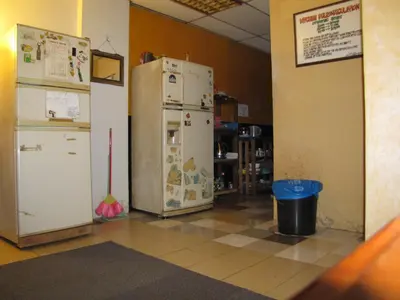 two refrigerators are sitting in a room at Oasis Guest House in Kuala Lumpur