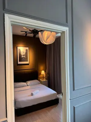 a bedroom with a bed and a ceiling fan at FHS Homestay @ Arte Plus Jalan Ampang T3-33A-07 in Kuala Lumpur