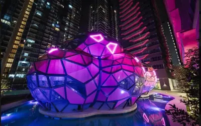 a purple glass orb with purple lights on a building at FHS Homestay @ Arte Plus Jalan Ampang T3-33A-07 in Kuala Lumpur