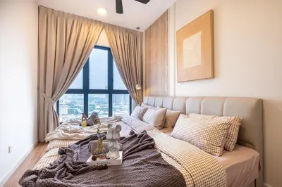 a bedroom with a bed with a large window at M Vertica KL Residence Tower E by Feel Home in Kuala Lumpur