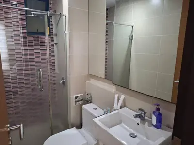 a bathroom with a toilet and a sink and a shower at 021-6 Sweet Home-Casa Residency in Kuala Lumpur