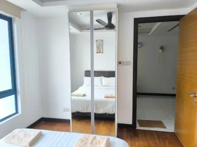 a mirror in a bedroom with a bed at 021-6 Sweet Home-Casa Residency in Kuala Lumpur