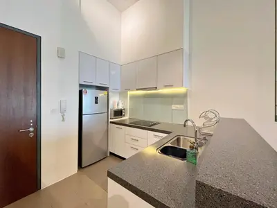 a kitchen with a sink and a refrigerator at Nana'S at EST Bangsar KL Sentral Gem Loft in Kuala Lumpur