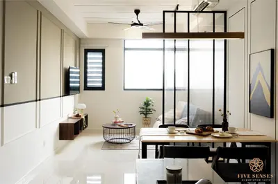 a living room with a table and chairs and a ceiling at Chambers Signature Suites, Kuala Lumpur in Kuala Lumpur
