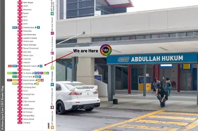 a car parked in front of a gas station at ViiA Residence, Mid Valley KL in Kuala Lumpur