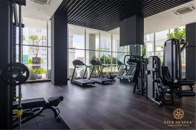 a gym with treadmills and cardio equipment in a building at Quill City Residences KLCC, Five Senses in Kuala Lumpur
