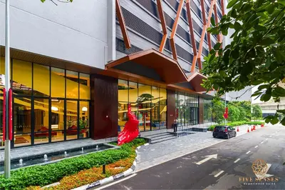 a building with a large red dress in front of it at Scarletz Signature Suites, KLCC in Kuala Lumpur