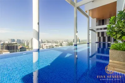 a swimming pool on the roof of a building at The Colony & The Luxe Signature Suites, KLCC in Kuala Lumpur