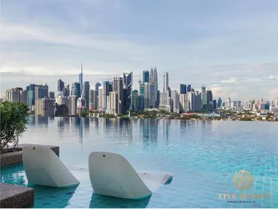 two white whales in the water with a city skyline at Datum Jelatek Residence, KLCC in Kuala Lumpur