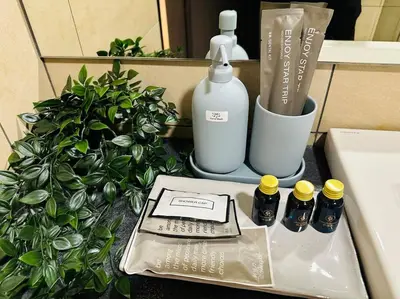 a bathroom counter with a sink and a bottle of soap at Opus Residence KL 118 Chinatown by \u54c1\u5c4b PINWU Shortstay in Kuala Lumpur