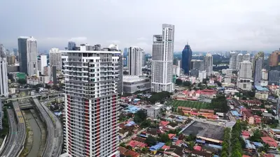 an aerial view of a city with tall buildings at Legasi Al Rahmat Kampung Baru in Kuala Lumpur