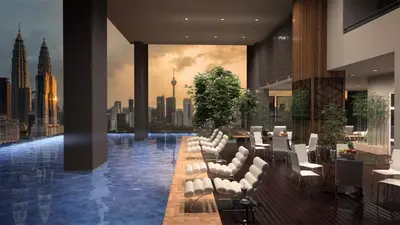 a hotel lobby with a view of a city at Legasi Al Rahmat Kampung Baru in Kuala Lumpur