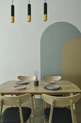 a table with two chairs and a table with plates at Razak City Residence in Kuala Lumpur