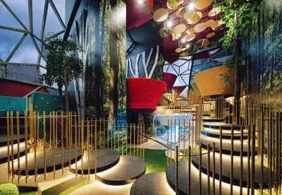 a room with a bunch of chairs and plants at Arte Plus Ampang KLCC City in Kuala Lumpur