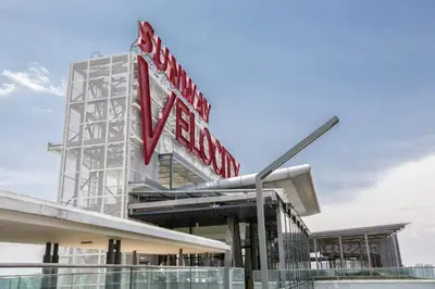 a large sign on the side of a stadium at V Residence at Sunway Velocity by MY TRIP & MY STAY in Kuala Lumpur