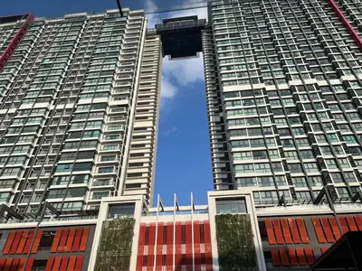 a tall building with a blue sky in the background at V Residence at Sunway Velocity by MY TRIP & MY STAY in Kuala Lumpur