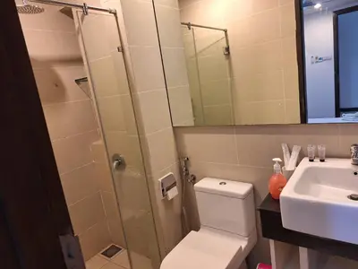 a bathroom with a shower and a toilet and a sink at 09-7 Sweet Home-Casa Residency in Kuala Lumpur