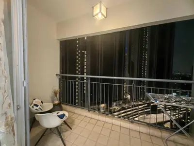 a balcony with a view of a city skyline at Villa Wangsamas By A.Golkar in Kuala Lumpur