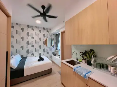 a bedroom with a bed and a ceiling fan at Comfy & Cozy Suites 3PX @ Colony, Near Monorail & Quill City Mall in Kuala Lumpur