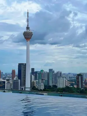 a large swimming pool with a view of a city at Comfy & Cozy Suites 3PX @ Colony, Near Monorail & Quill City Mall in Kuala Lumpur