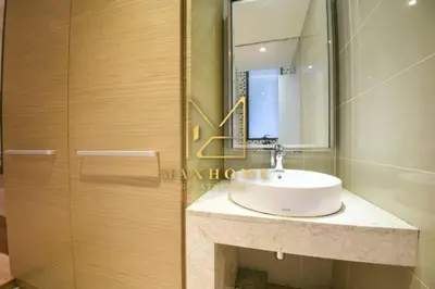 a bathroom with a sink and a mirror at Cozy Suites @ D’majestic Place, KL City Centre in Kuala Lumpur