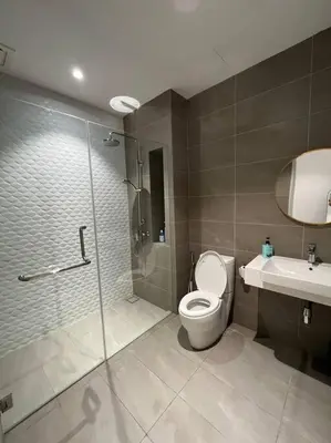 a bathroom with a shower and a toilet and a sink at SOGO PWTC KLCC Monorail link Quill Mall 7Pax in Kuala Lumpur
