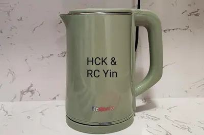a green mug with the words lick and roxy on it at Lovely Family Suites at Razak City by HCK in Kuala Lumpur