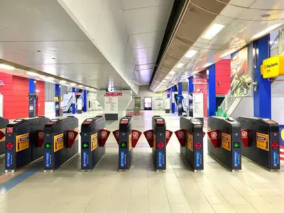 a row of parking meters in a shopping mall at The Establishment Bangsar KL by Lynhomes in Kuala Lumpur