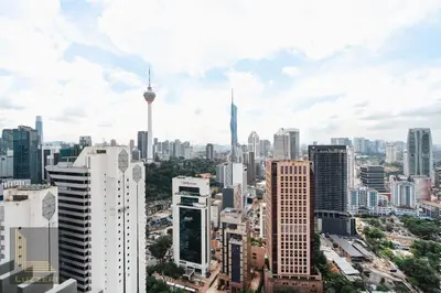 a view of a city with tall buildings at Colony Chow Kit Guesthouse in Kuala Lumpur