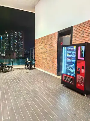 a coca cola vending machine in a building at Chambers Residence KLCC By Purple Orchid in Kuala Lumpur