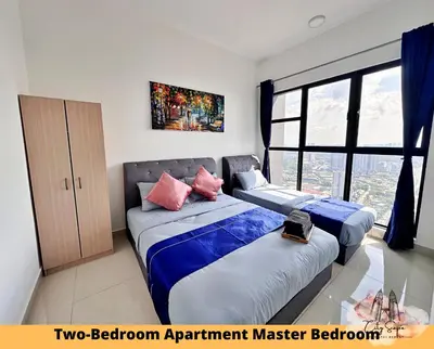 a bedroom with two beds and a large window at Trion @ Kuala Lumpur near KLCC TRX by Cityscape in Kuala Lumpur