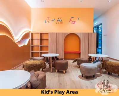 a kids play area with tables and chairs at Trion @ Kuala Lumpur near KLCC TRX by Cityscape in Kuala Lumpur