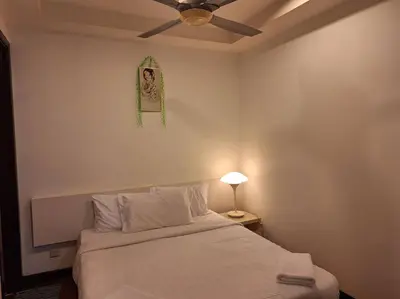 a bedroom with a bed and a ceiling fan at 026-3A Sweet Home-Casa Residency 2R 2B in Kuala Lumpur