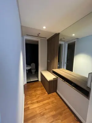 a room with a desk and a toilet in it at Anggun KL Mal in Kuala Lumpur