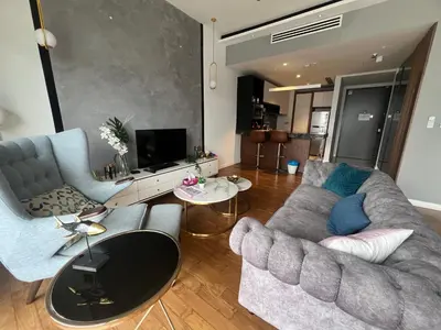 a living room with two couches and a tv at Anggun KL MY in Kuala Lumpur