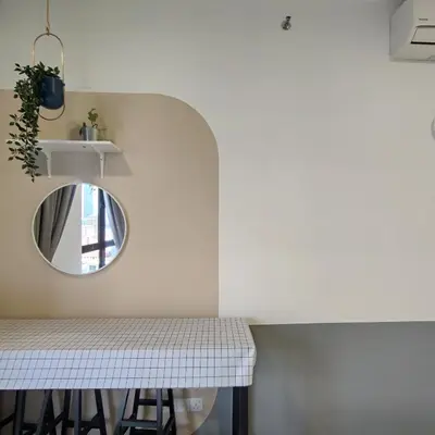 a mirror on the wall above a counter in a room at TRION Studio 4 PAX Teneleven in Kuala Lumpur