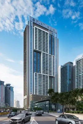 a large building with cars parked in front of it at The Platinum KLCC By Classy in Kuala Lumpur