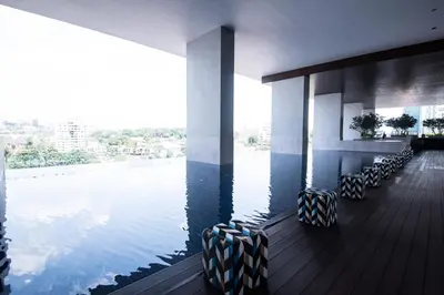a swimming pool with a view of the water at KLCC EST Bangsar By PSM in Kuala Lumpur