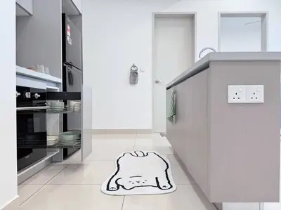 a kitchen with a dog rug on the floor at NEW Scandinavian Modern TRX KL 2 Bedrooms in Kuala Lumpur