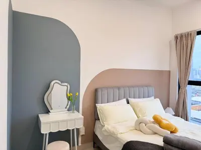 a bedroom with a bed with a mirror on it at NEW Scandinavian Modern TRX KL 2 Bedrooms in Kuala Lumpur