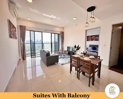 a living room with a table and a couch at Trion Kuala Lumpur Near Sunway Velocity KLCC TRX Bukit Bintang in Kuala Lumpur