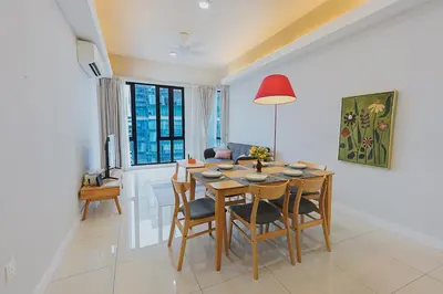 a kitchen and dining room with a table and chairs at SS KL Sentral by NomadNest in Kuala Lumpur