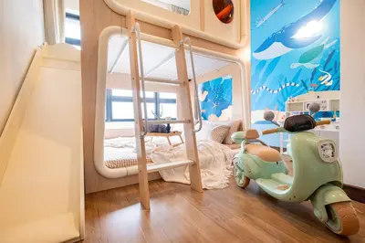 a childs bedroom with a scooter in a room at Premium Classy 4Room@Astoria Ampang 12pax 6km KLCC in Kuala Lumpur