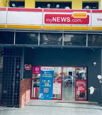 a store front of a store with signs on it at Premium Stay at Bukit Bintang City Centre by Premium Stay in Kuala Lumpur