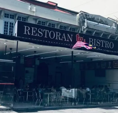 a restaurant with a sign that reads restaurant for a bistro at Premium Stay at Bukit Bintang City Centre by Premium Stay in Kuala Lumpur