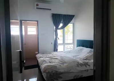 a bedroom with a bed and a window at Razak City Centre KL SkyView 45th in Kuala Lumpur