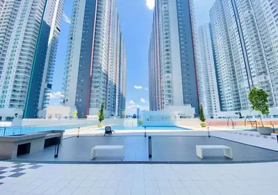 a park in a city with tall buildings at Razak City Centre KL SkyView 45th in Kuala Lumpur