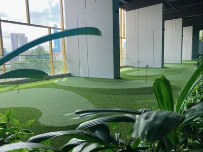 a room with a golf course in a building at Opus Signatures ChinaTown 118 in Kuala Lumpur