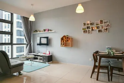 a living room with a table and a dining room at Home Sweet Home at Robertson Bukit Bintang,trx,klcc,pavilion,lalaport in Kuala Lumpur